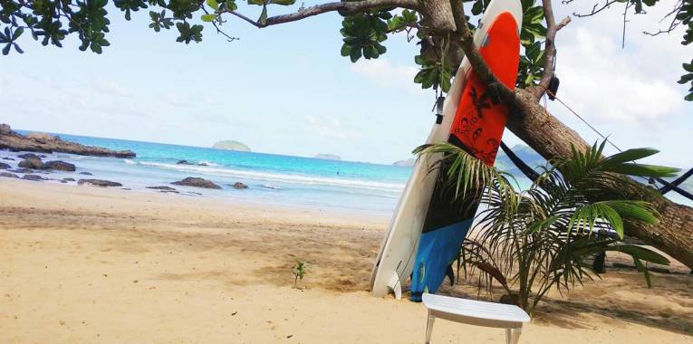 Surfing in Nacpan Beach, El Nido, Palawan