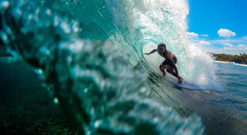 Surfer Luke Landrigan riding the waves in La Union
